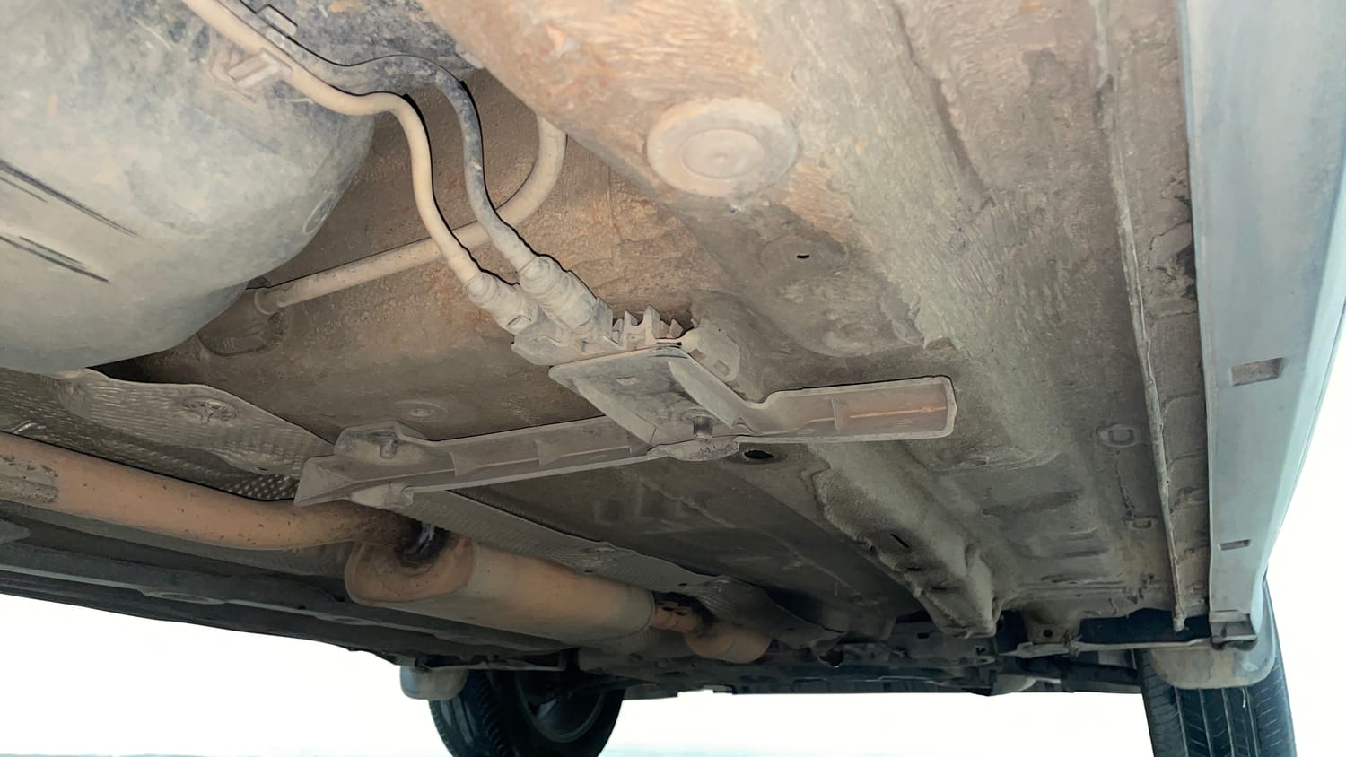 Used 2022 Volkswagen Taigun Topline 1.0 TSI MT Petrol Manual extra REAR RIGHT UNDERBODY VIEW