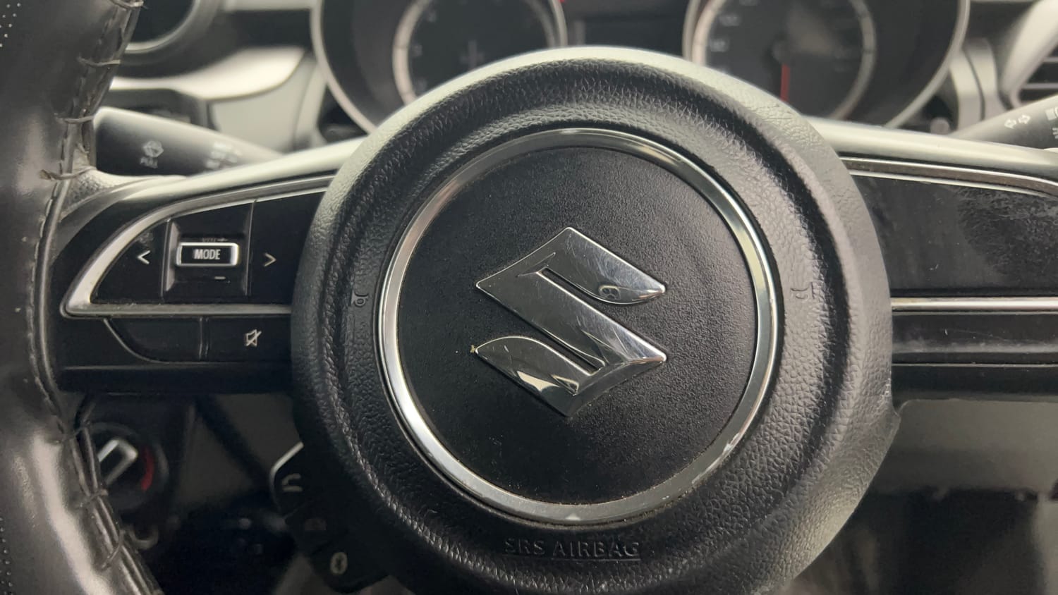 Used 2022 Maruti Suzuki Swift VXi Petrol Manual top_features Steering mounted controls