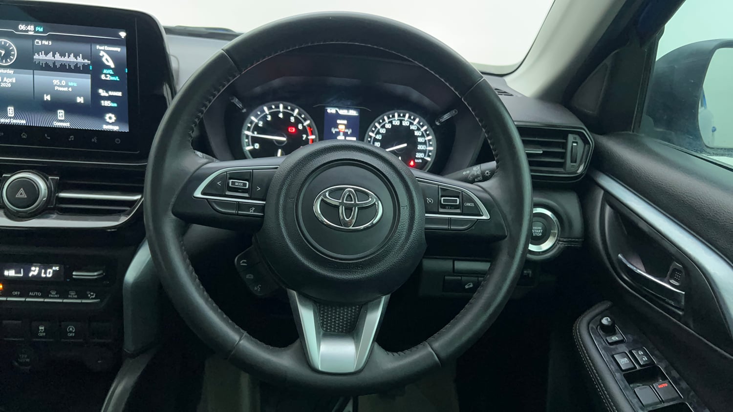 Used 2023 Toyota Urban Cruiser Hyryder V Neodrive AWD Dual tone Petrol Manual interior STEERING VIEW
