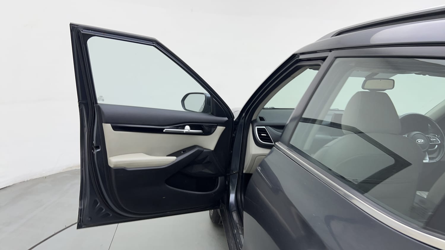 Used 2020 Kia Seltos HTX 1.5 Petrol Manual interior LEFT FRONT DOOR OPEN VIEW