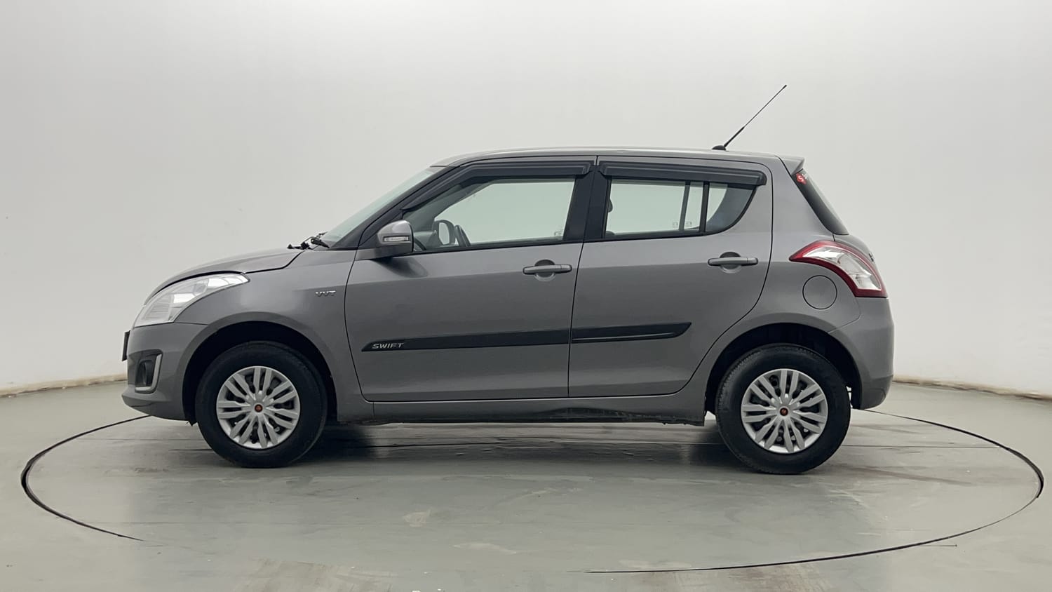 Used 2017 Maruti Suzuki Swift VXi Petrol Manual exterior LEFT SIDE VIEW