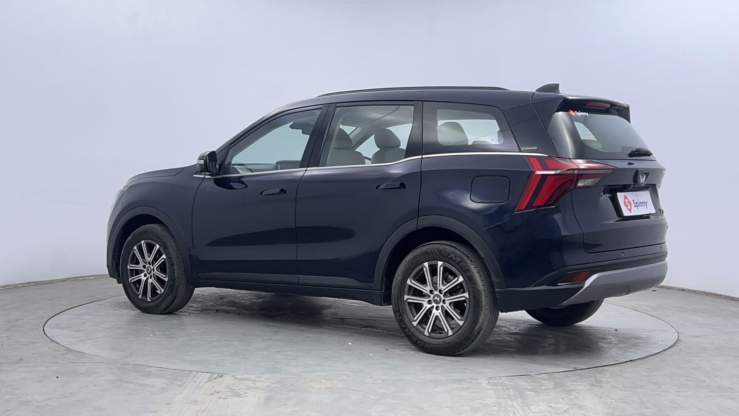 Used 2021 Mahindra XUV700 AX 7 Petrol AT Luxury Pack 7 STR Petrol Automatic exterior LEFT REAR CORNER VIEW