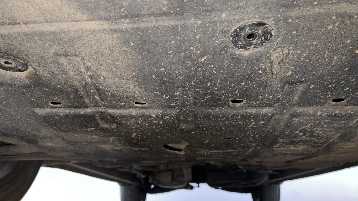 Used 2021 Mahindra XUV700 AX 7 Petrol AT Luxury Pack 7 STR Petrol Automatic extra FRONT LEFT UNDERBODY VIEW
