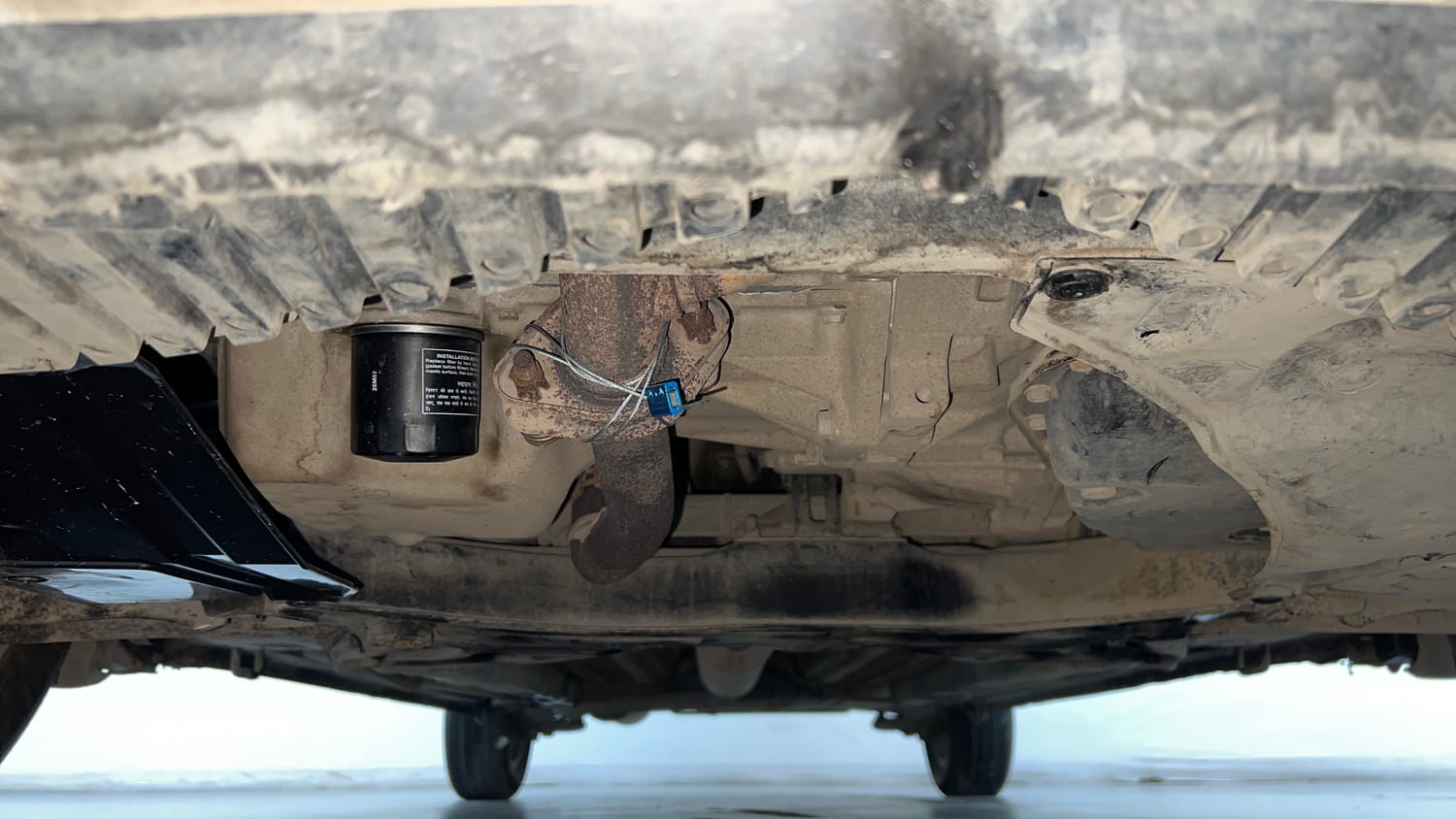 Used 2017 Maruti Suzuki Ertiga VXI AT Petrol Automatic extra FRONT LEFT UNDERBODY VIEW