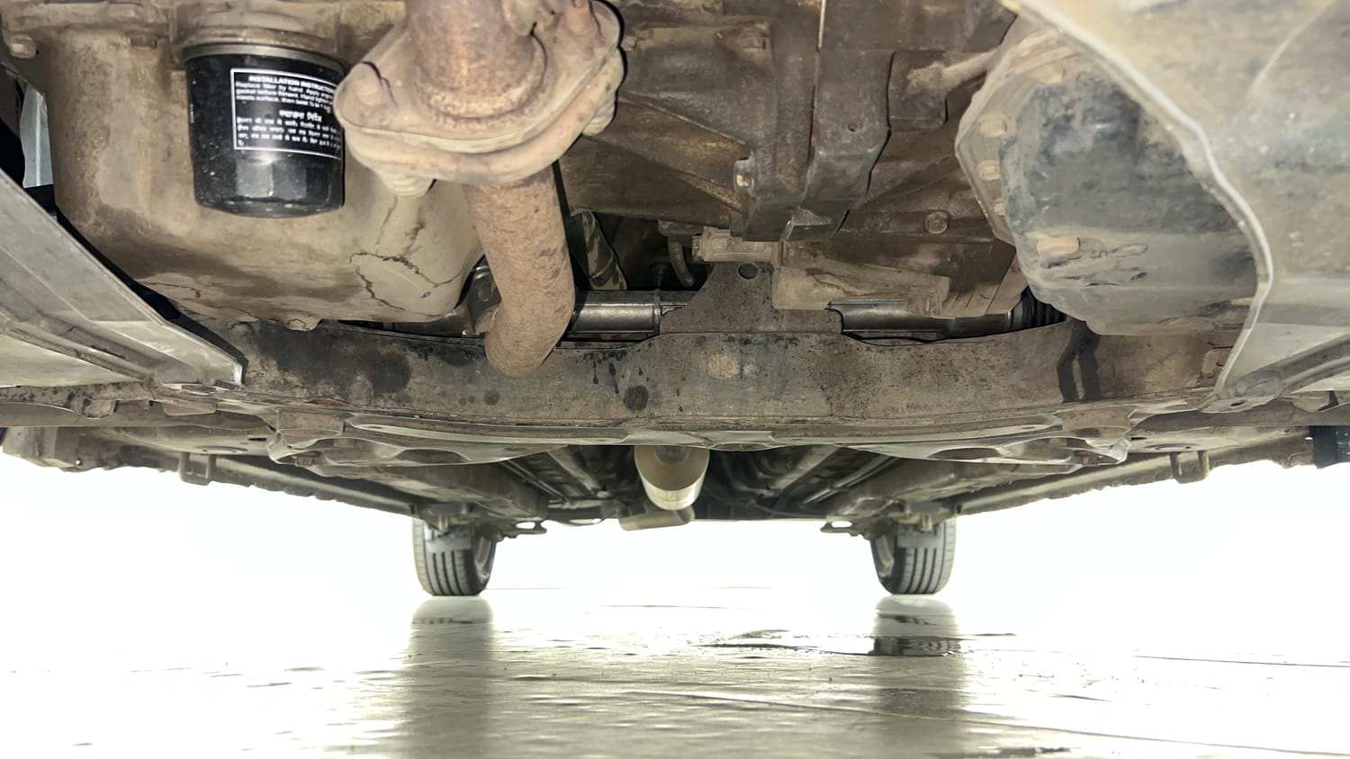 Used 2017 Maruti Suzuki Ciaz ZXi  AT Petrol Automatic extra FRONT LEFT UNDERBODY VIEW