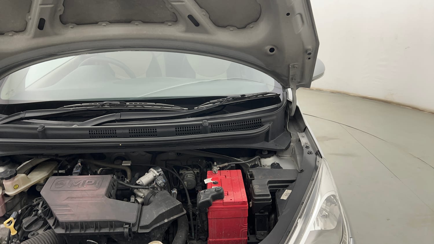 Used 2022 Hyundai Santro Sportz Petrol Manual engine ENGINE LEFT SIDE HINGE & APRON VIEW