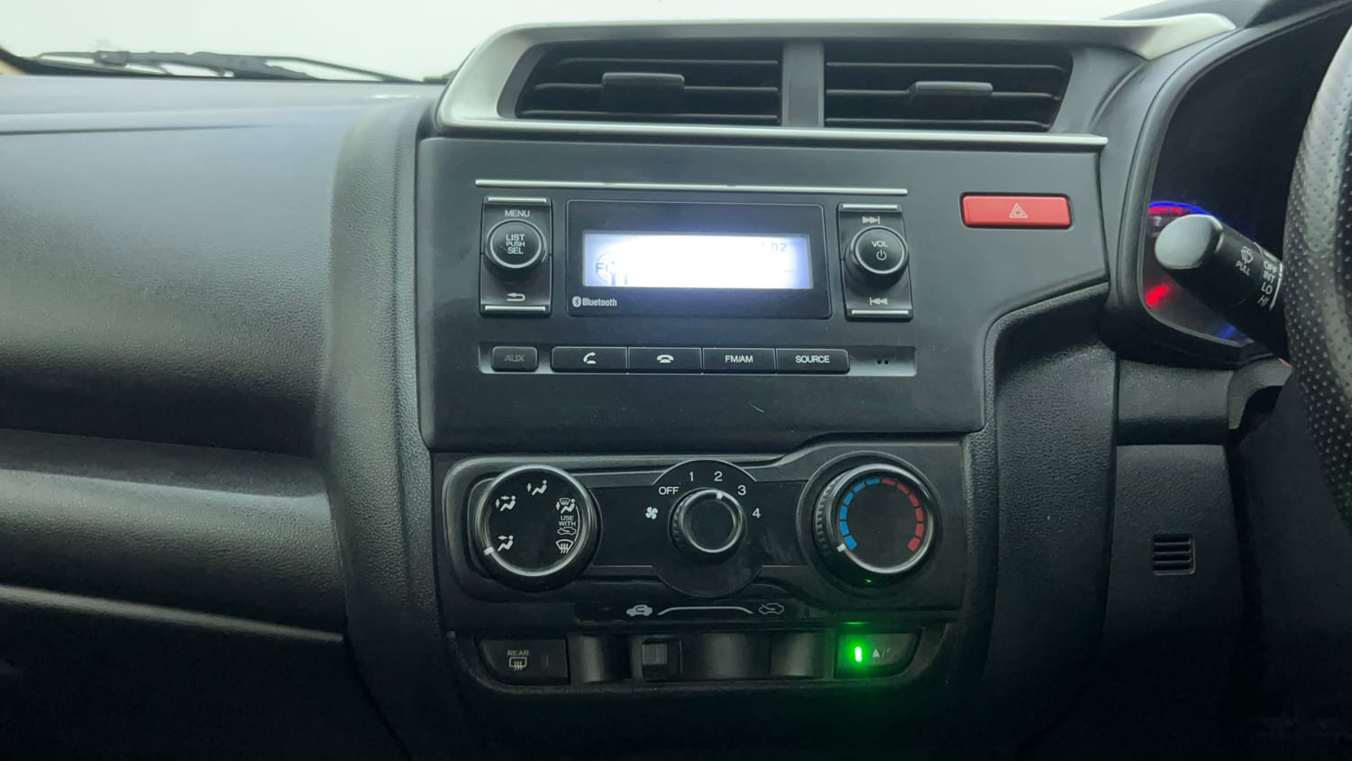 Used 2015 Honda Jazz S AT Petrol Automatic interior MUSIC SYSTEM & AC CONTROL VIEW