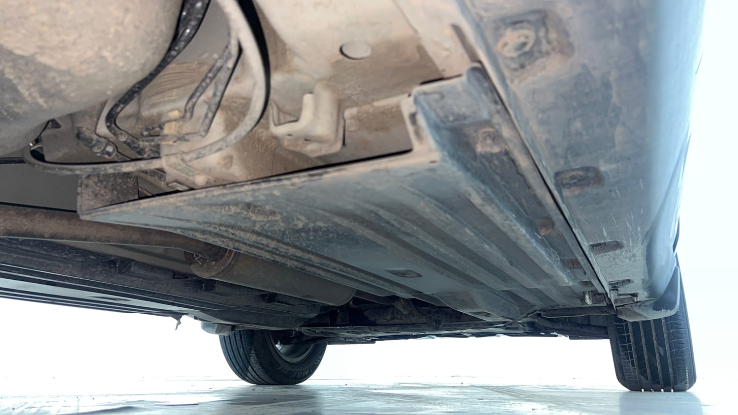 Used 2022 Maruti Suzuki Brezza ZXi Plus AT Petrol Automatic extra REAR RIGHT UNDERBODY VIEW