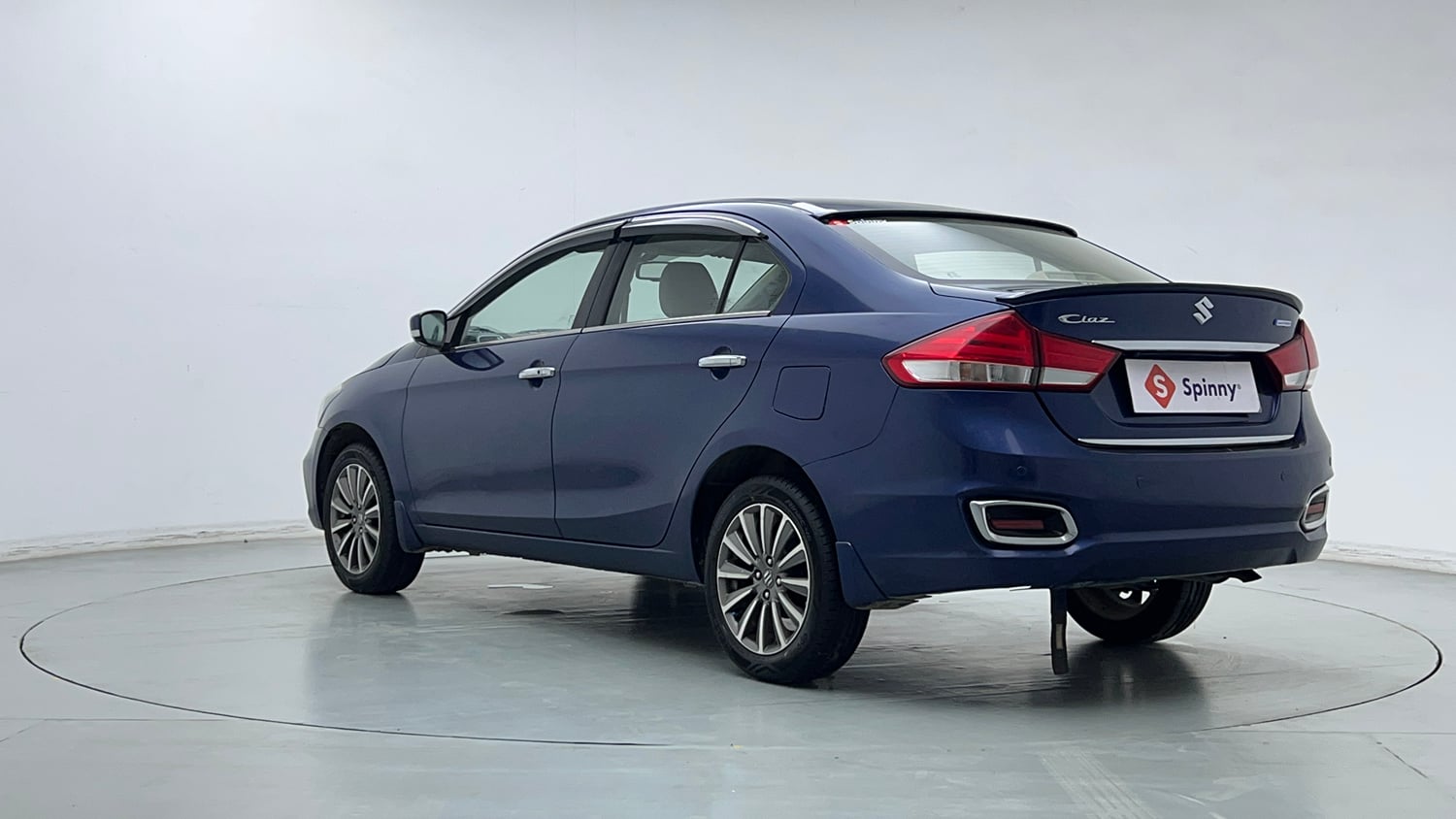 Used 2021 Maruti Suzuki Ciaz Alpha Hybrid 1.5 Petrol Manual exterior LEFT REAR CORNER VIEW