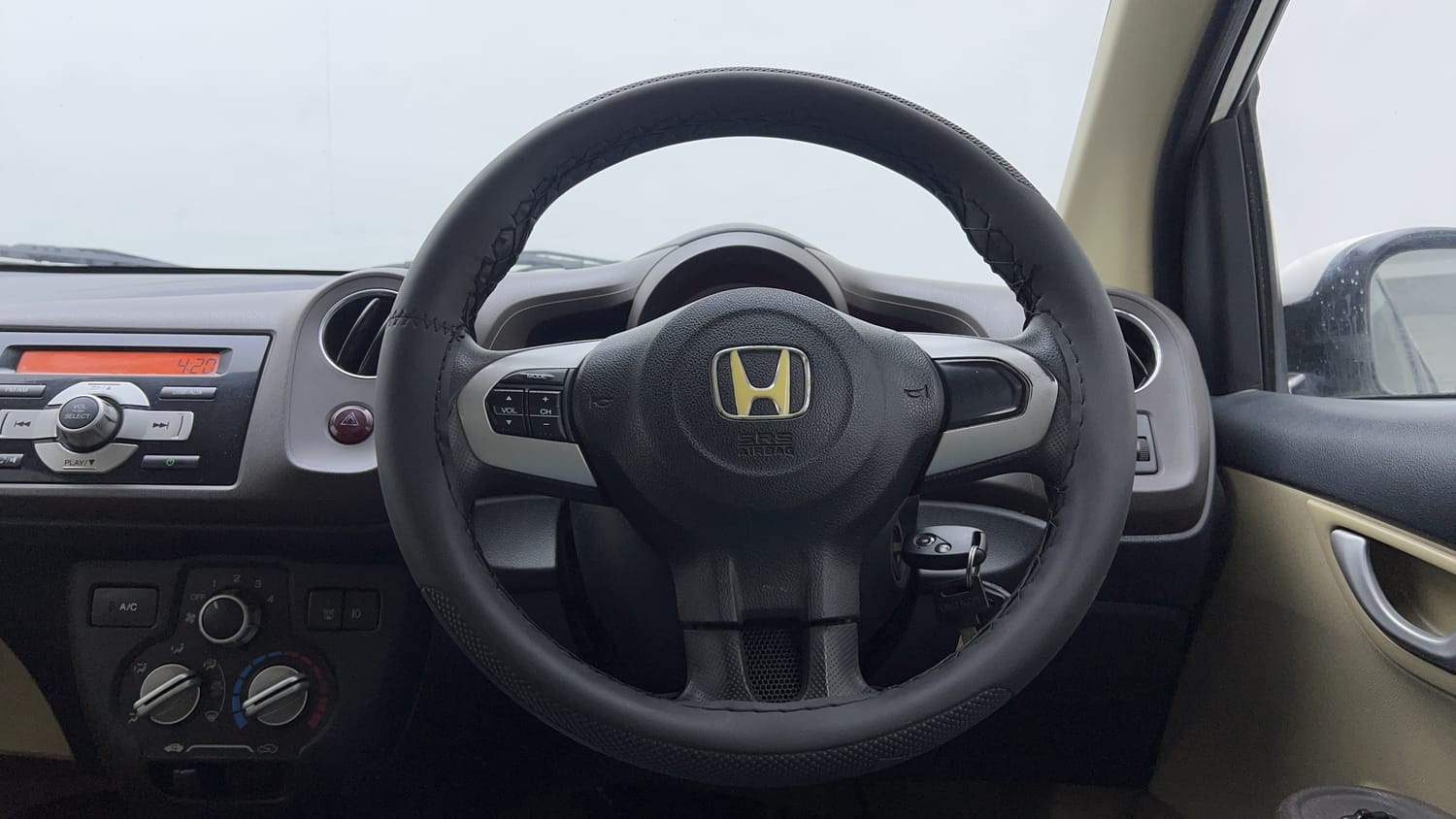 Used 2013 Honda Brio VX MT Petrol Manual interior STEERING VIEW