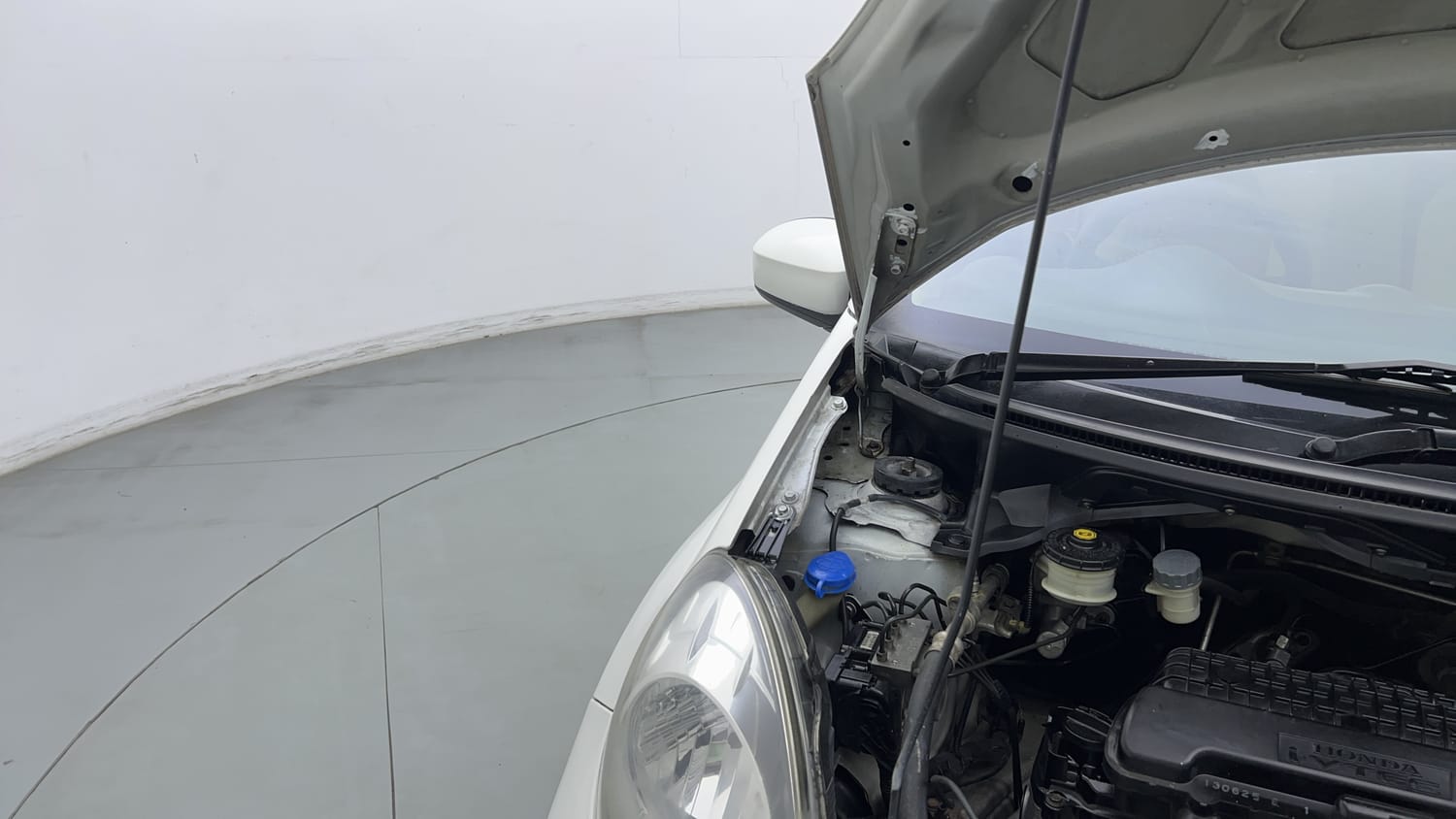 Used 2013 Honda Brio VX MT Petrol Manual engine ENGINE RIGHT SIDE HINGE & APRON VIEW