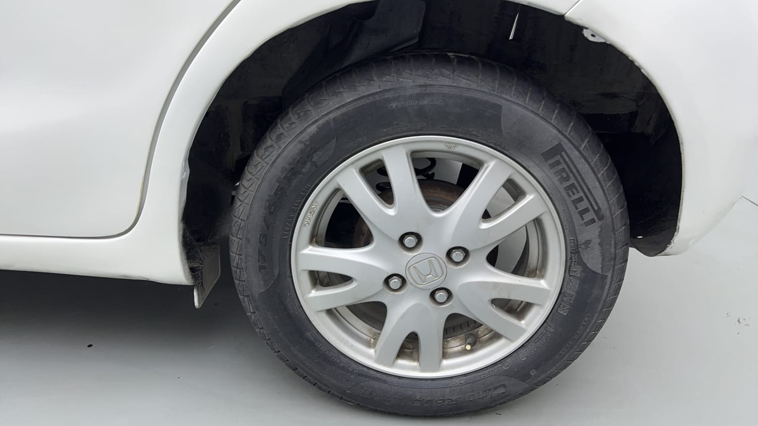 Used 2013 Honda Brio VX MT Petrol Manual tyres LEFT REAR TYRE RIM VIEW