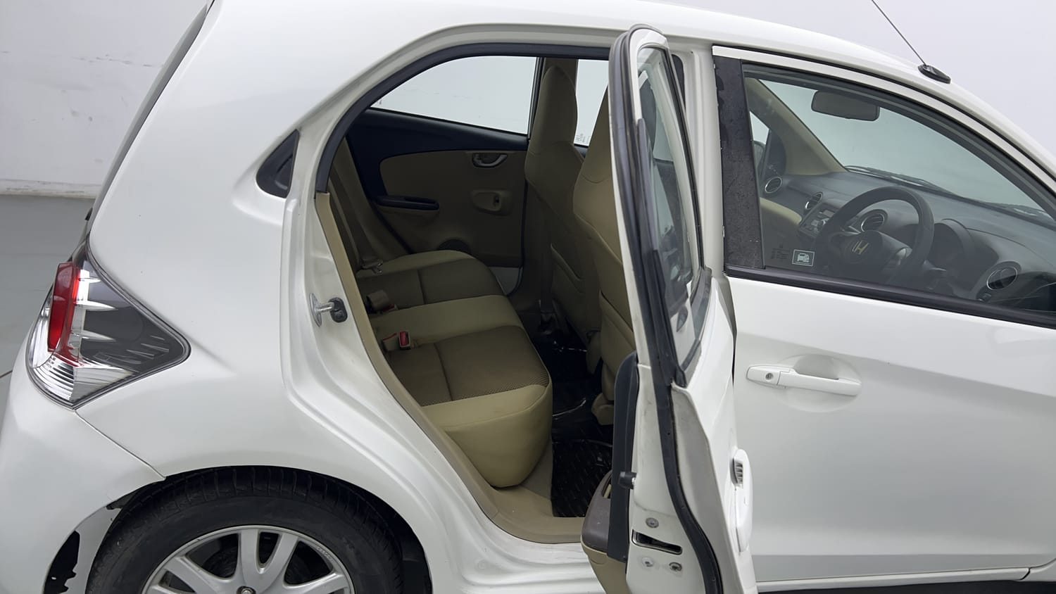 Used 2013 Honda Brio VX MT Petrol Manual interior RIGHT SIDE REAR DOOR CABIN VIEW