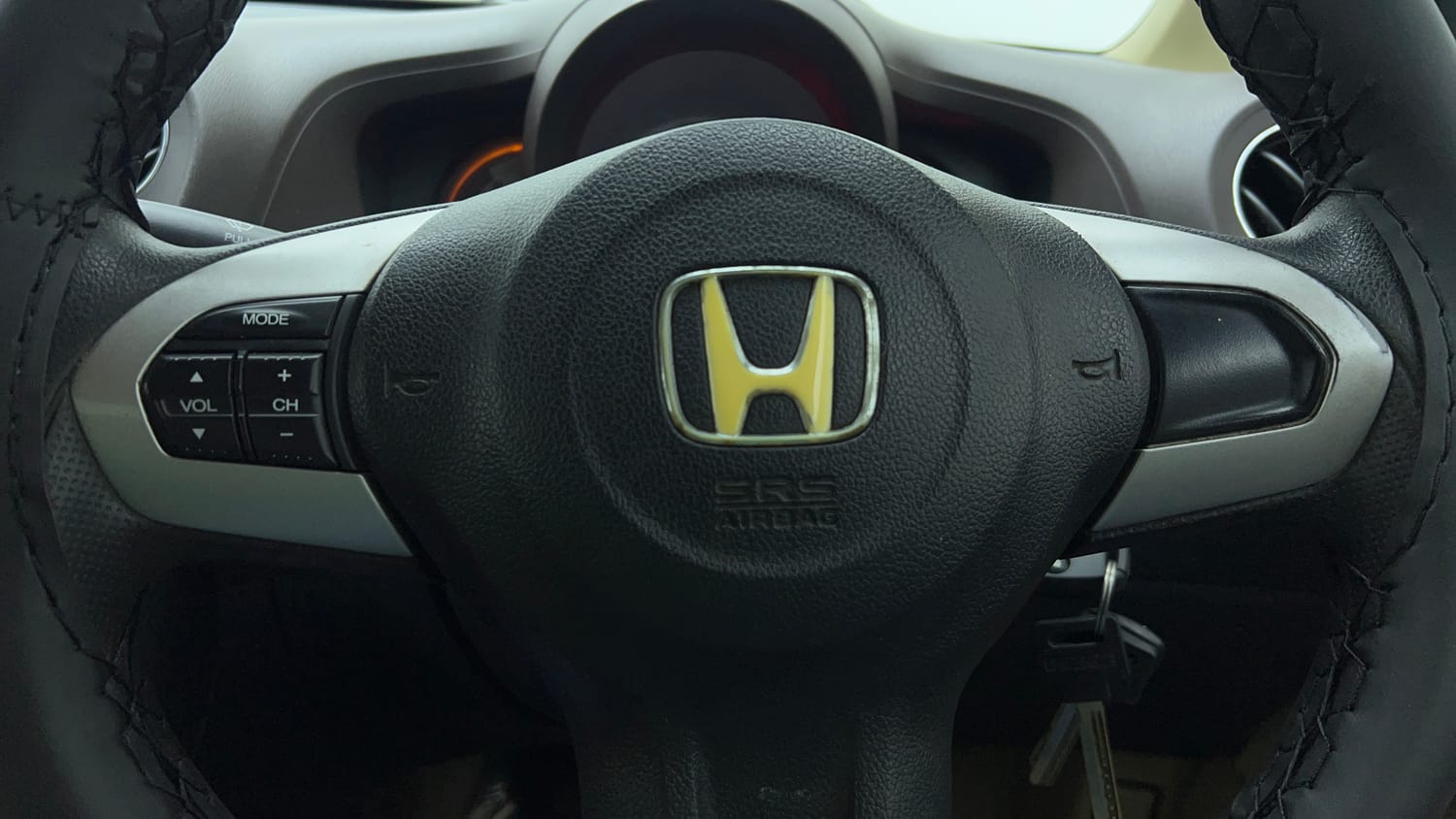 Used 2013 Honda Brio VX MT Petrol Manual top_features Steering mounted controls