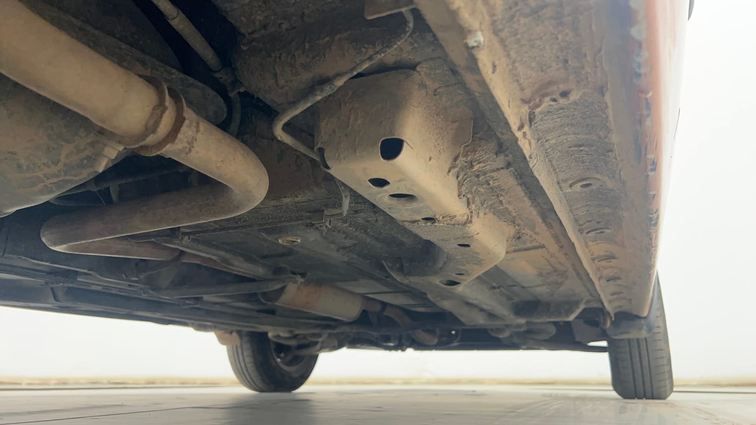 Used 2018 Tata Tiago Revotron XE Petrol Manual extra REAR RIGHT UNDERBODY VIEW