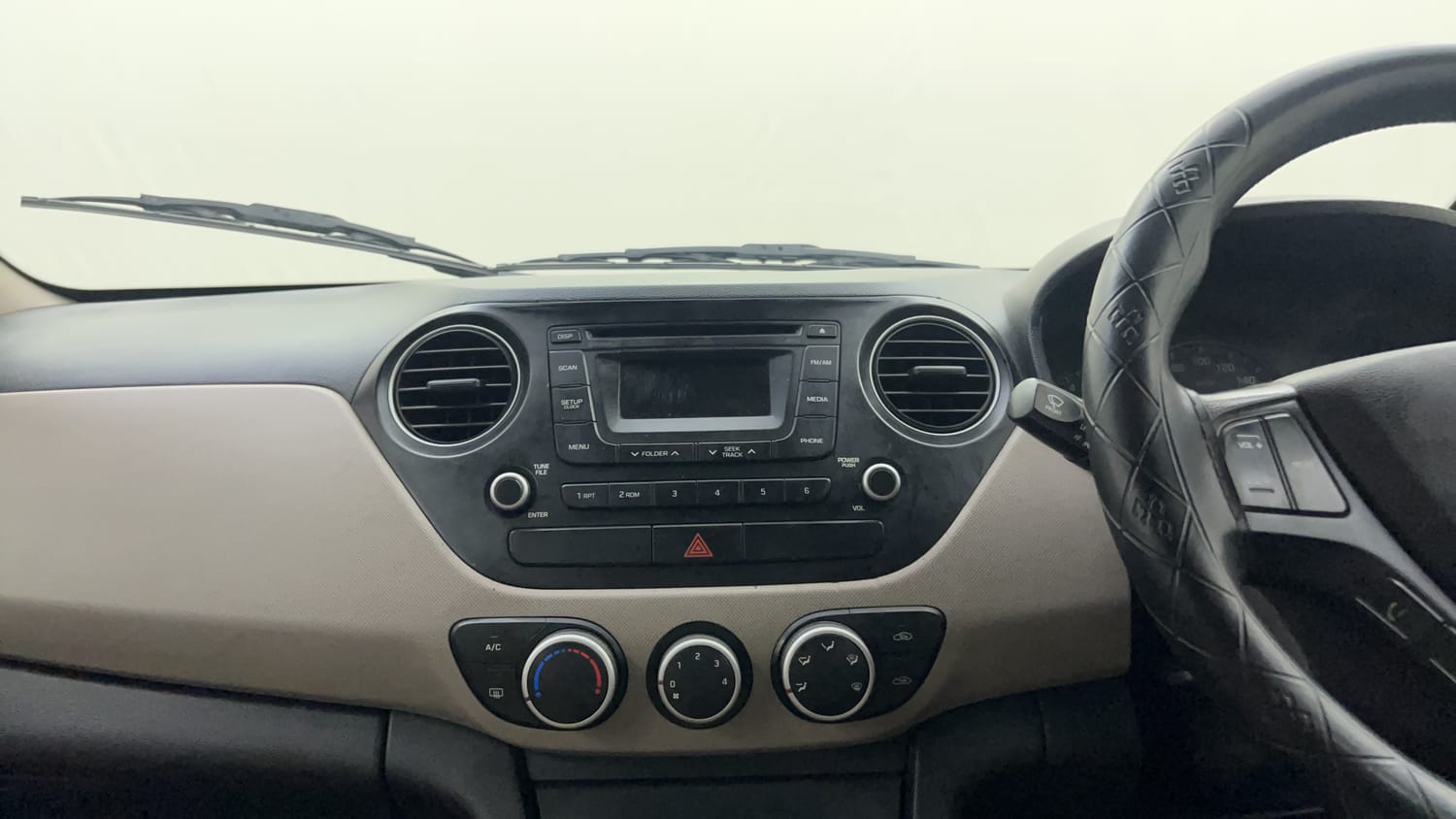 Used 2015 Hyundai Xcent SX 1.1 CRDi Diesel Manual interior MUSIC SYSTEM & AC CONTROL VIEW