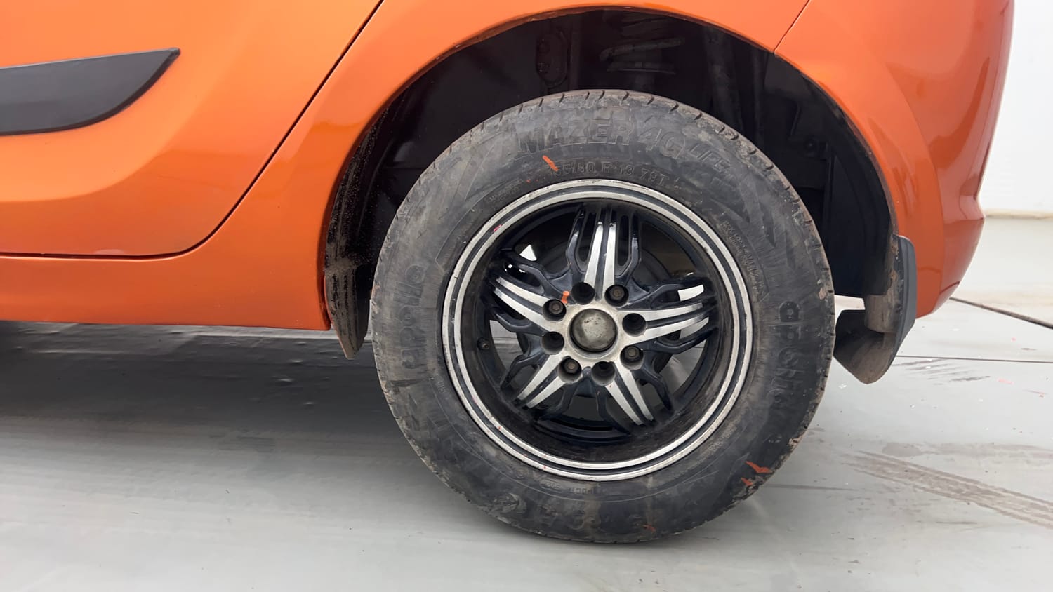 Used 2018 Tata Tiago Revotron XE Petrol Manual tyres LEFT REAR TYRE RIM VIEW