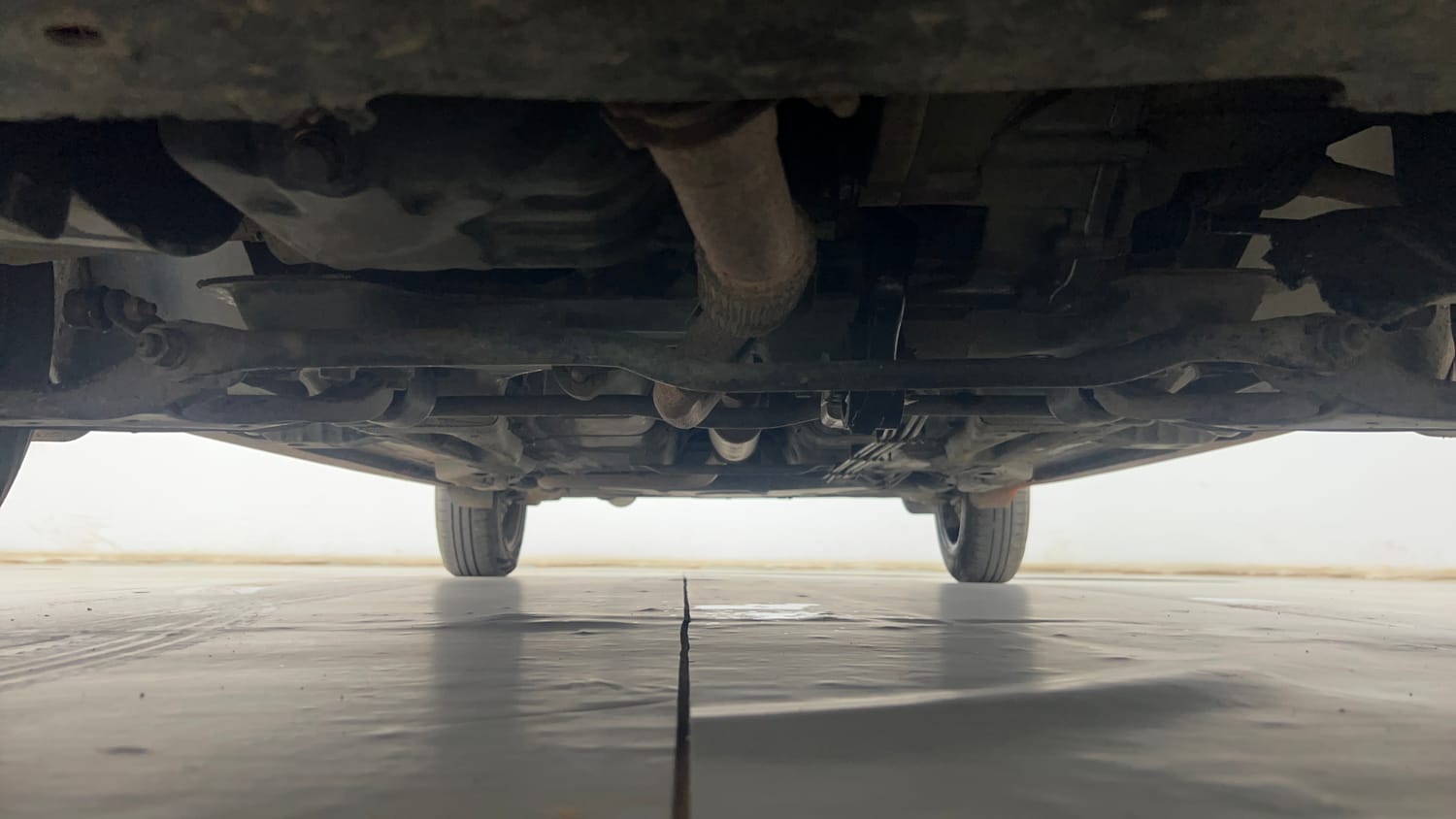 Used 2018 Tata Tiago Revotron XE Petrol Manual extra FRONT LEFT UNDERBODY VIEW