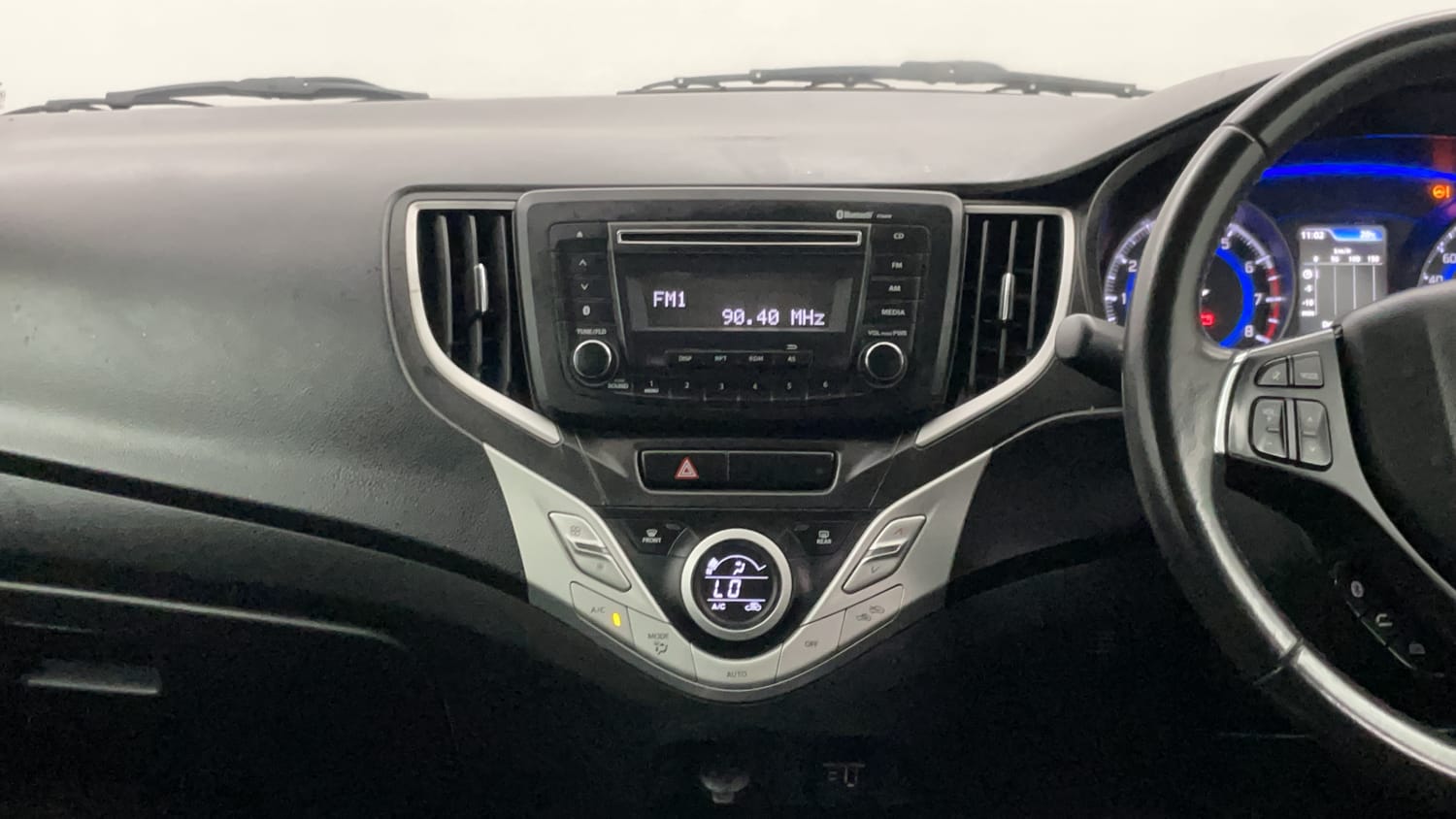 Used 2018 Maruti Suzuki Baleno Zeta 1.2 Petrol Manual interior MUSIC SYSTEM & AC CONTROL VIEW