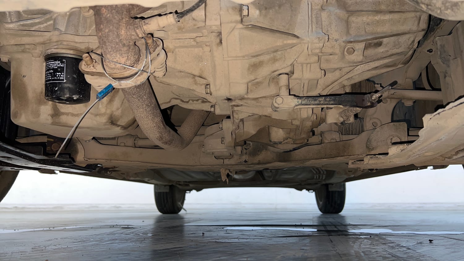 Used 2020 Maruti Suzuki Baleno Zeta Petrol Manual extra FRONT LEFT UNDERBODY VIEW