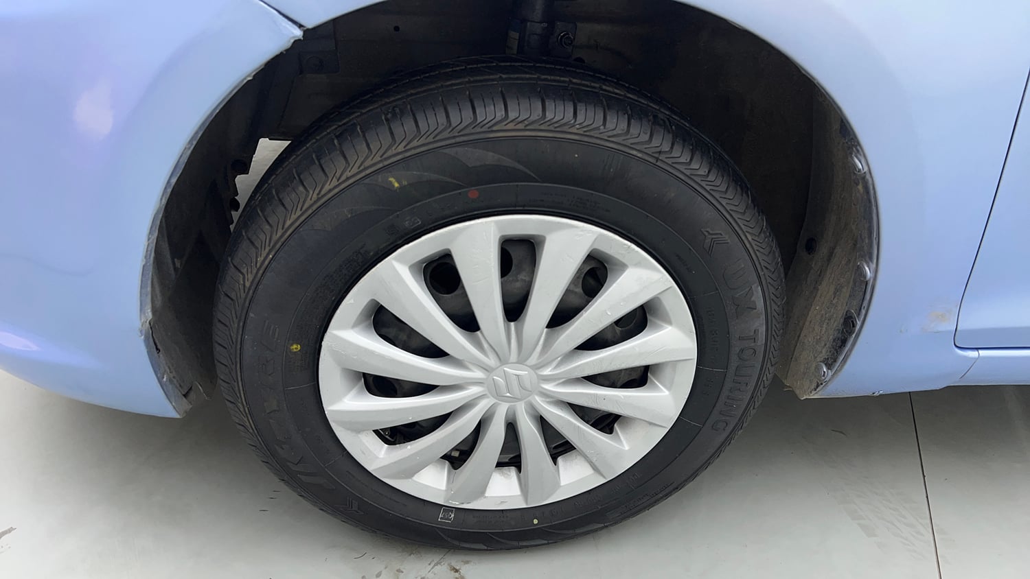 Used 2015 Maruti Suzuki Swift Dzire VXI Petrol Manual tyres LEFT FRONT TYRE RIM VIEW