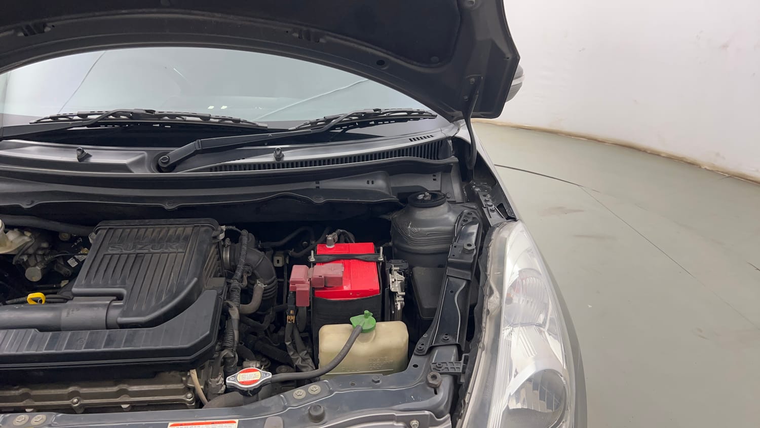 Used 2012 Maruti Suzuki Swift VXi Petrol Manual engine ENGINE LEFT SIDE HINGE & APRON VIEW