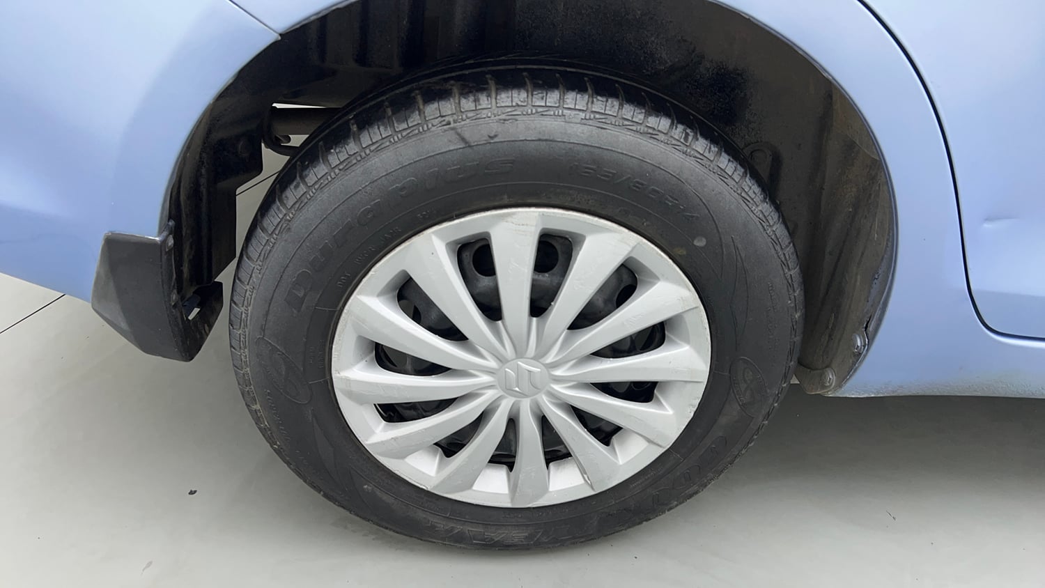 Used 2015 Maruti Suzuki Swift Dzire VXI Petrol Manual tyres RIGHT REAR TYRE RIM VIEW