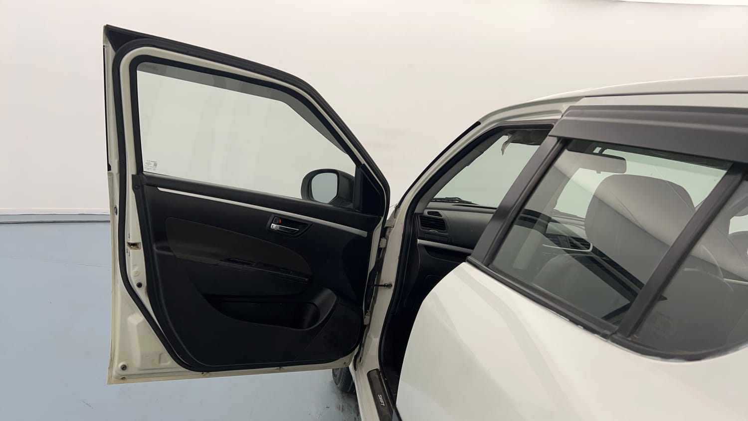 Used 2014 Maruti Suzuki Swift VXi Petrol Manual interior LEFT FRONT DOOR OPEN VIEW