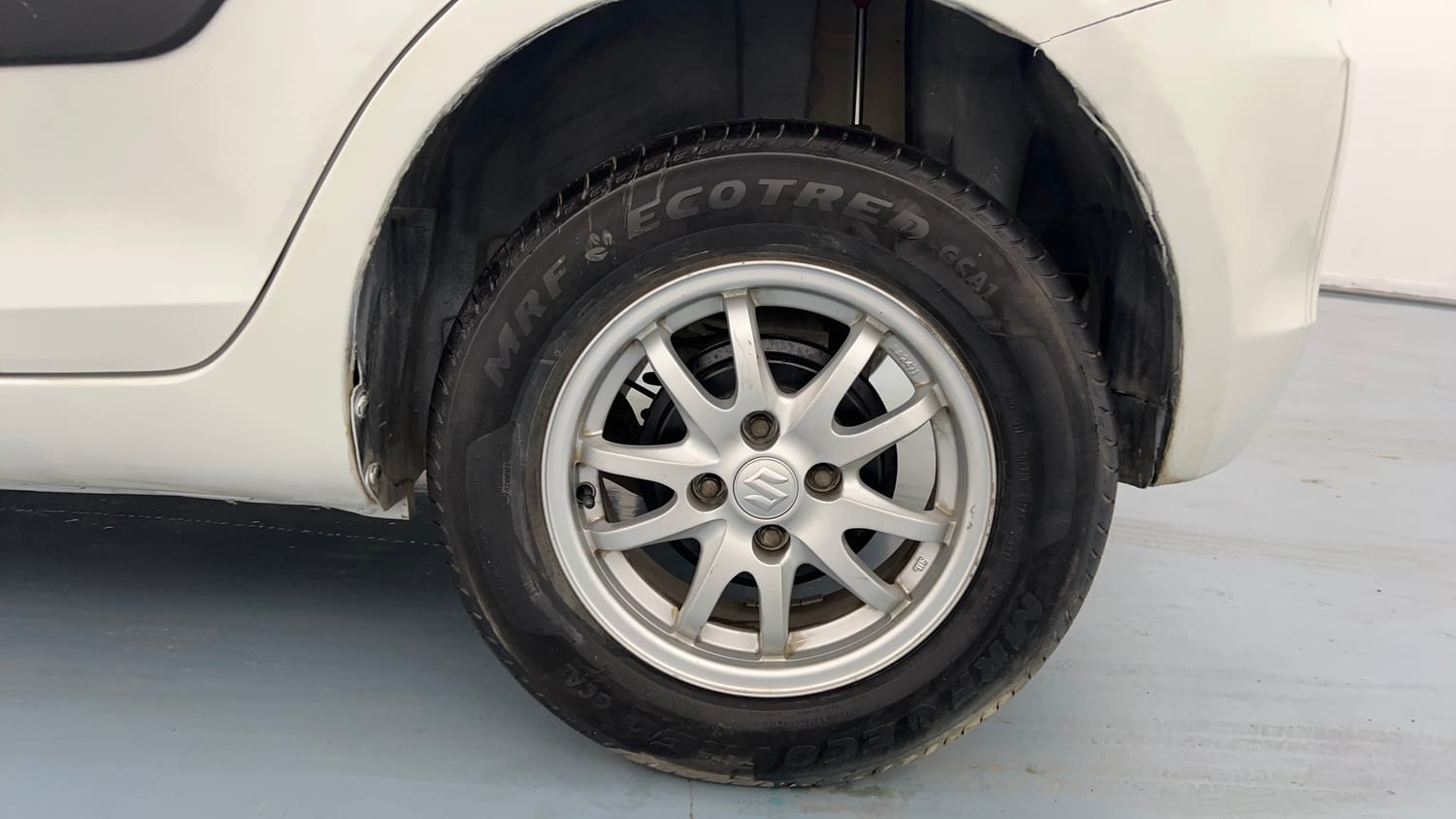 Used 2014 Maruti Suzuki Swift VXi Petrol Manual tyres LEFT REAR TYRE RIM VIEW