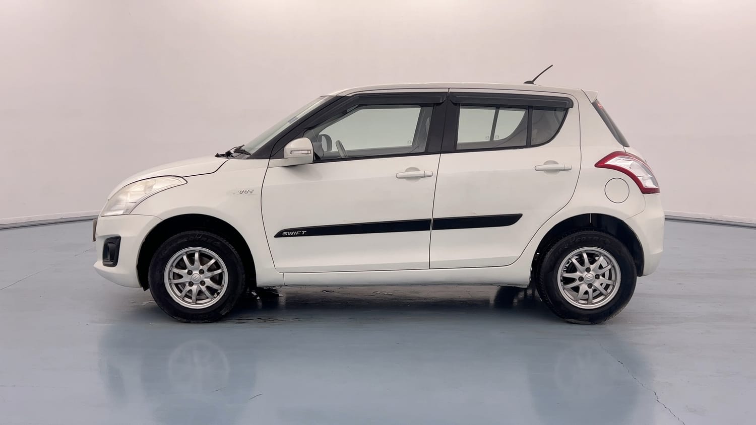 Used 2014 Maruti Suzuki Swift VXi Petrol Manual exterior LEFT SIDE VIEW