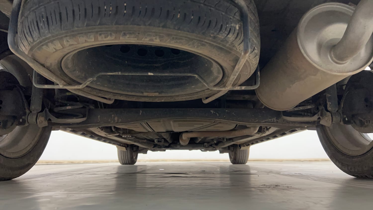 Used 2023 Maruti Suzuki XL6 Alpha MT Petrol Petrol Manual extra REAR UNDERBODY VIEW (TAKEN FROM REAR)