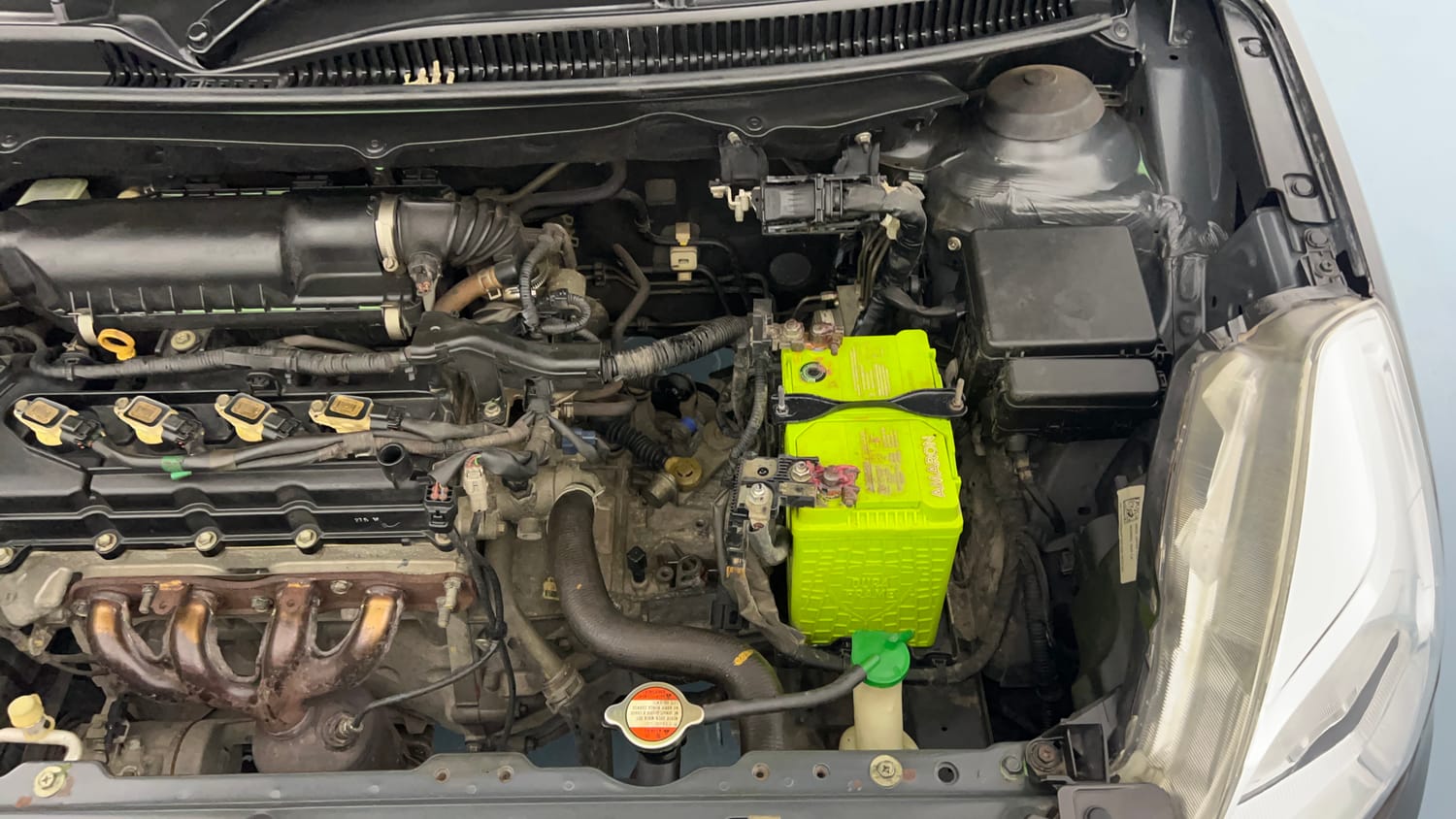 Used 2016 Maruti Suzuki Baleno Zeta 1.2 Petrol Manual engine ENGINE LEFT SIDE VIEW
