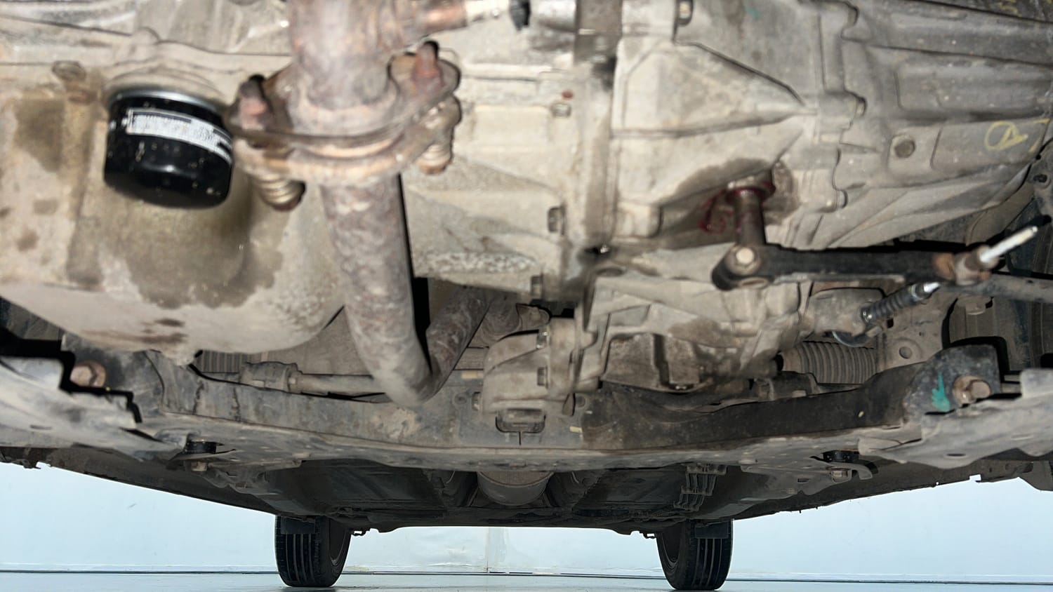 Used 2016 Maruti Suzuki Baleno Zeta 1.2 Petrol Manual extra FRONT LEFT UNDERBODY VIEW