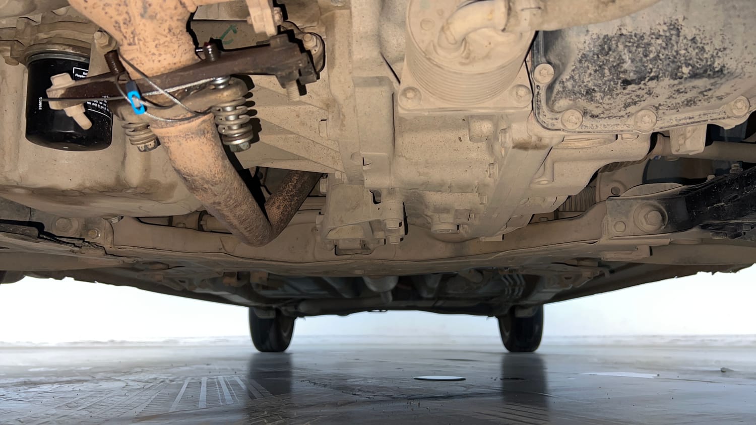 Used 2023 Maruti Suzuki Ertiga ZXi Plus AT Petrol Automatic extra FRONT LEFT UNDERBODY VIEW