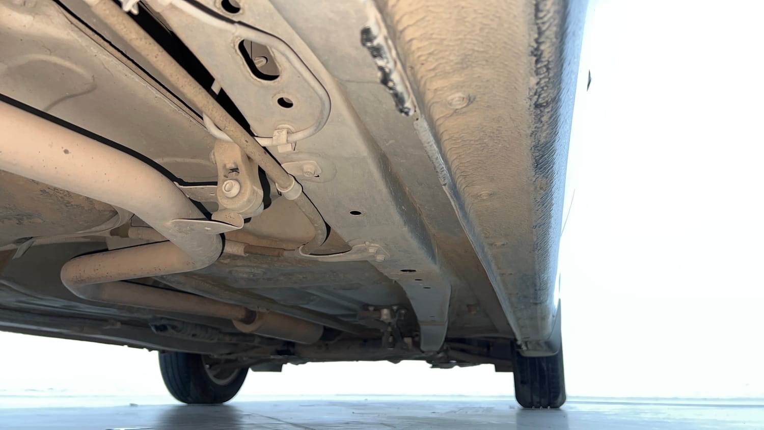 Used 2023 Maruti Suzuki Ertiga ZXi Plus AT Petrol Automatic extra REAR RIGHT UNDERBODY VIEW