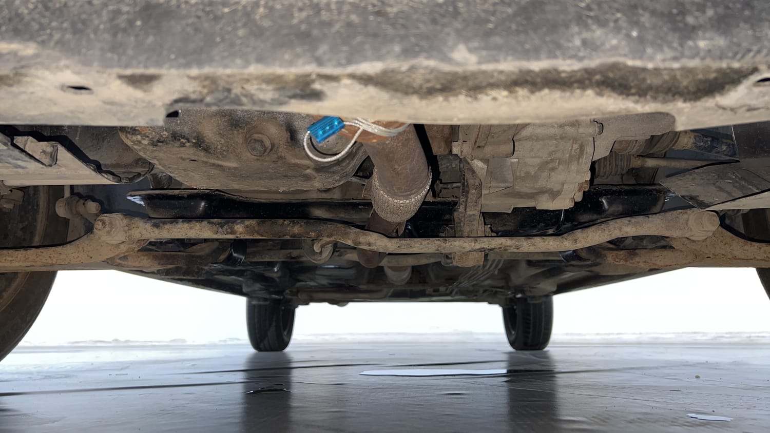 Used 2022 Tata Tigor XZ Plus CNG Cng Manual extra FRONT LEFT UNDERBODY VIEW