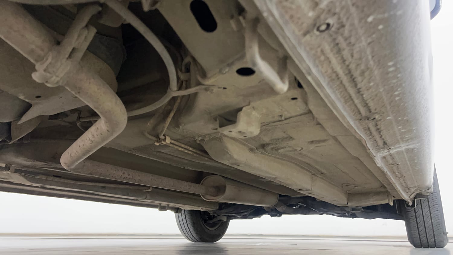 Used 2014 Maruti Suzuki Celerio VXi AMT Petrol Automatic extra REAR RIGHT UNDERBODY VIEW