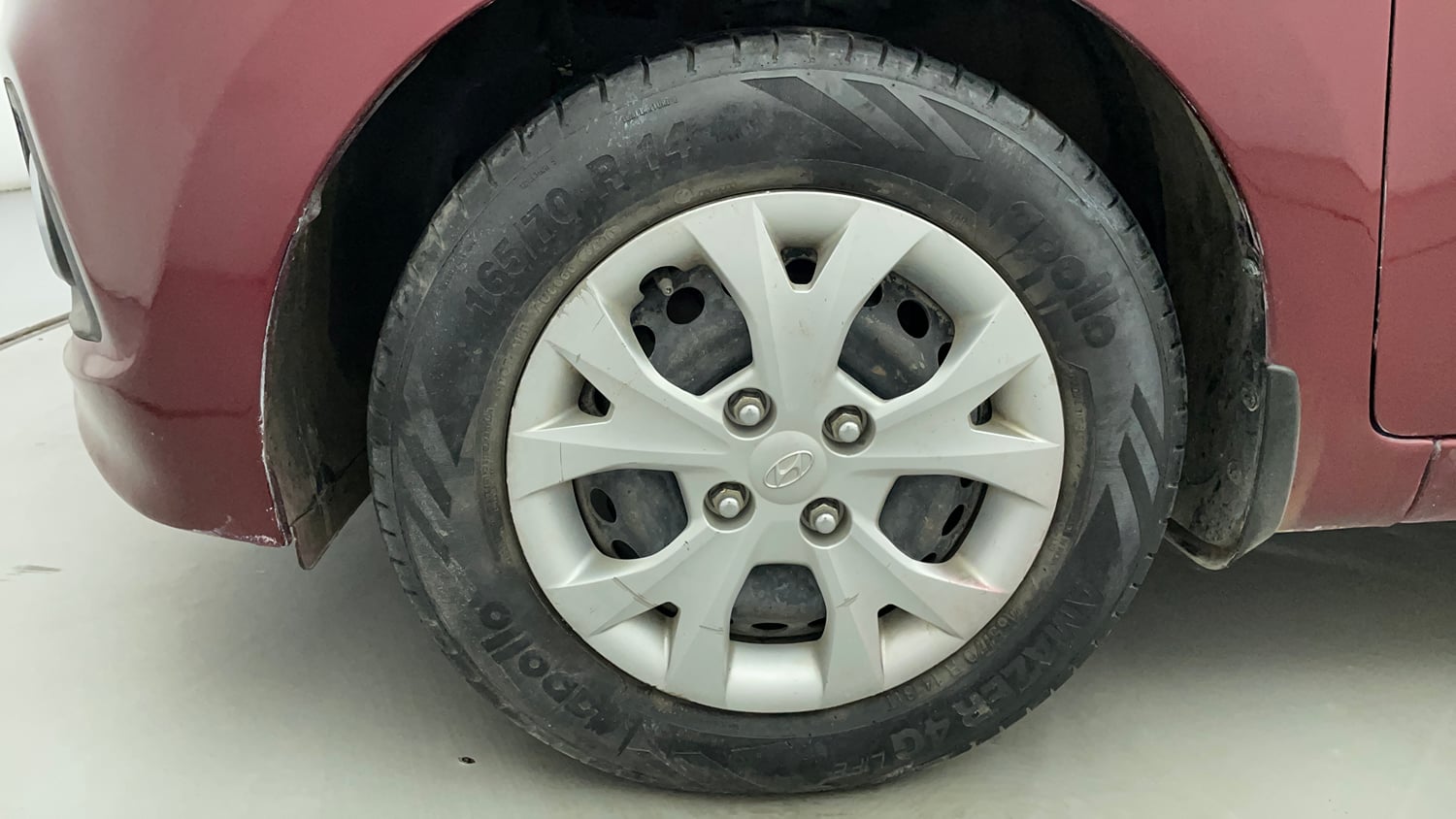 Used 2015 Hyundai Grand i10 Magna 1.2 Kappa VTVT Petrol Manual tyres LEFT FRONT TYRE RIM VIEW