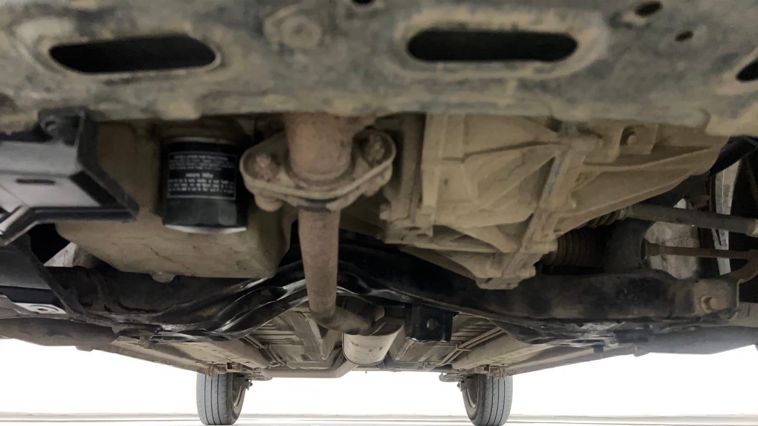 Used 2014 Maruti Suzuki Celerio VXi AMT Petrol Automatic extra FRONT LEFT UNDERBODY VIEW