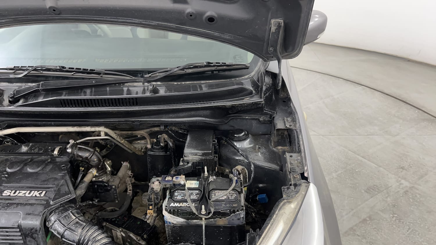 Used 2014 Maruti Suzuki Celerio VXi AMT Petrol Automatic engine ENGINE LEFT SIDE HINGE & APRON VIEW