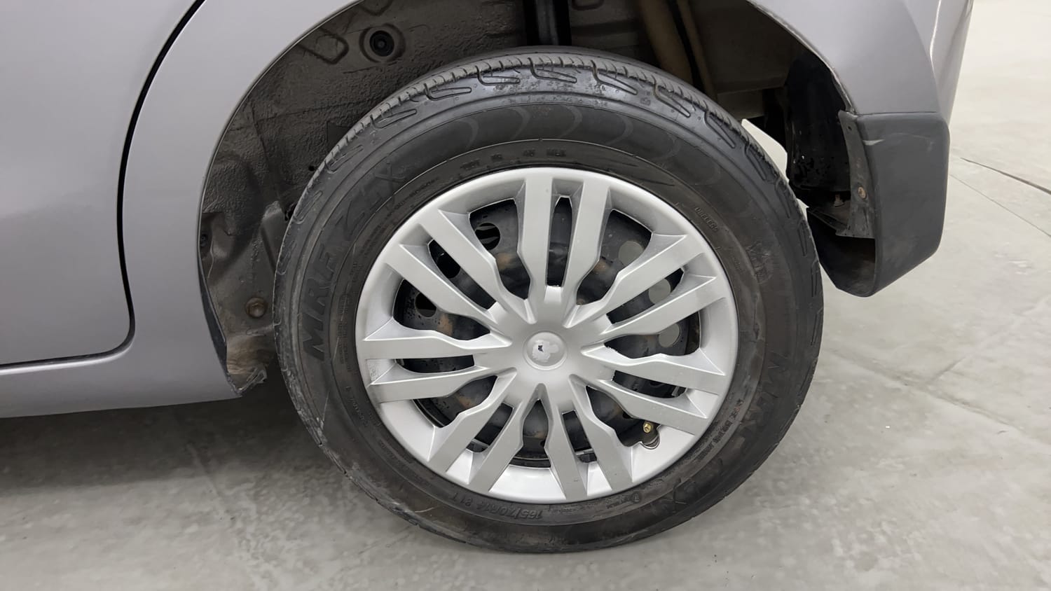 Used 2014 Maruti Suzuki Celerio VXi AMT Petrol Automatic tyres LEFT REAR TYRE RIM VIEW