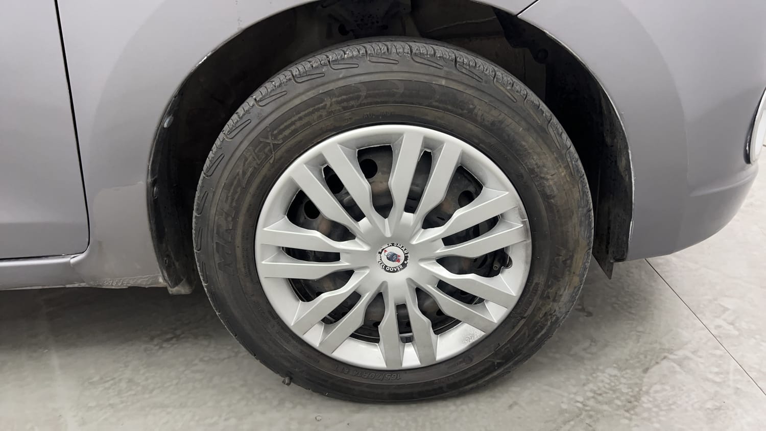 Used 2014 Maruti Suzuki Celerio VXi AMT Petrol Automatic tyres RIGHT FRONT TYRE RIM VIEW