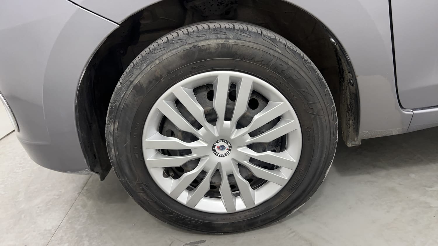 Used 2014 Maruti Suzuki Celerio VXi AMT Petrol Automatic tyres LEFT FRONT TYRE RIM VIEW