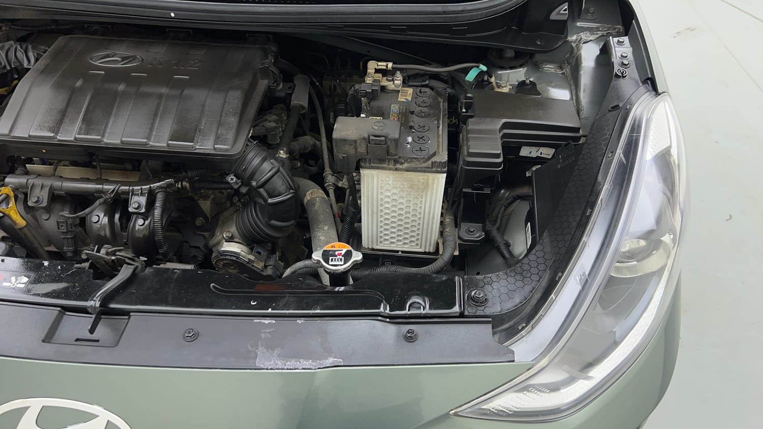 Used 2024 Hyundai Grand i10 Nios Sportz 1.2 Kappa VTVT Petrol Manual engine ENGINE LEFT SIDE VIEW