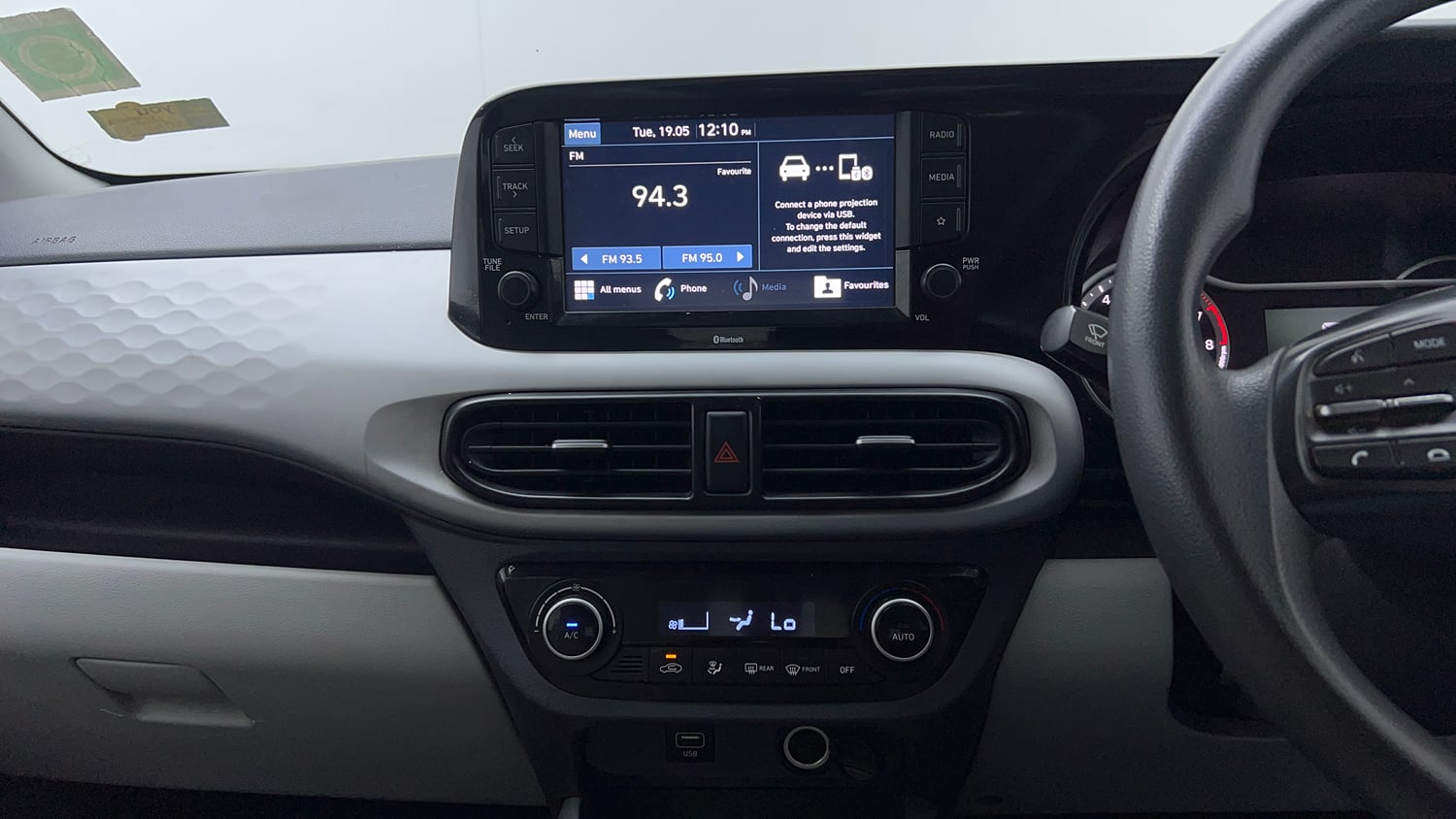 Used 2021 Hyundai Grand i10 Nios Sportz 1.2 Kappa VTVT Petrol Manual interior MUSIC SYSTEM & AC CONTROL VIEW