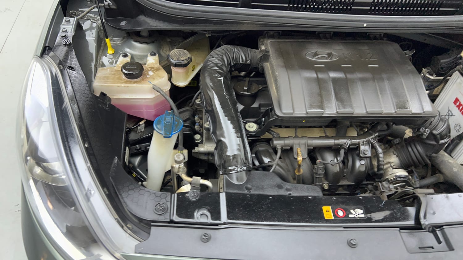 Used 2024 Hyundai Grand i10 Nios Sportz 1.2 Kappa VTVT Petrol Manual engine ENGINE RIGHT SIDE VIEW