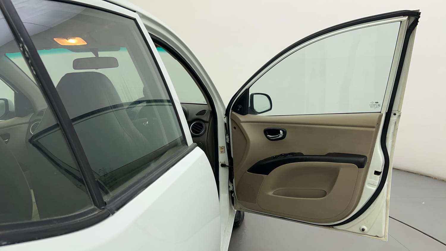 Used 2013 Hyundai i10 Magna 1.1 iRDE2 Petrol Manual interior RIGHT FRONT DOOR OPEN VIEW