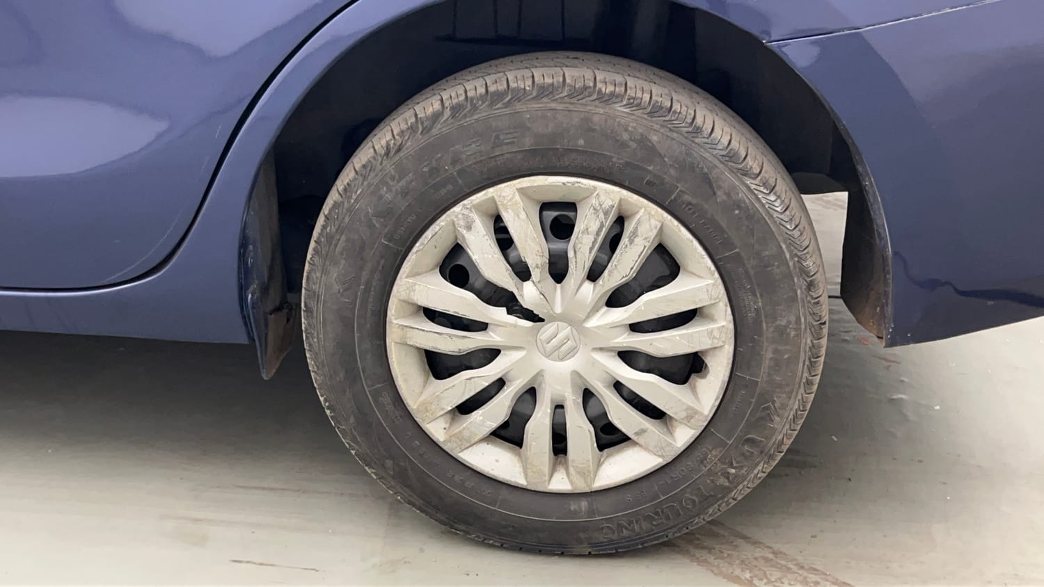 Used 2019 Maruti Suzuki Dzire VXi Petrol Manual tyres LEFT REAR TYRE RIM VIEW
