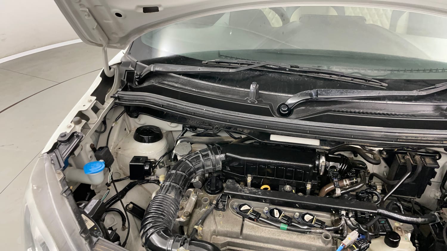 Used 2021 Maruti Suzuki Wagon R 1.0 VXi (O) 1.0 AMT Petrol Automatic engine ENGINE RIGHT SIDE HINGE & APRON VIEW