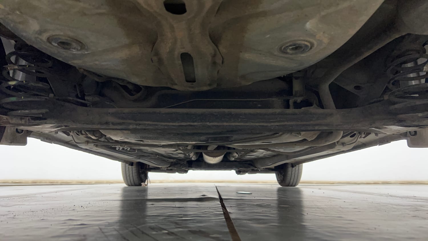 Used 2019 Maruti Suzuki Dzire VXi Petrol Manual extra REAR UNDERBODY VIEW (TAKEN FROM REAR)